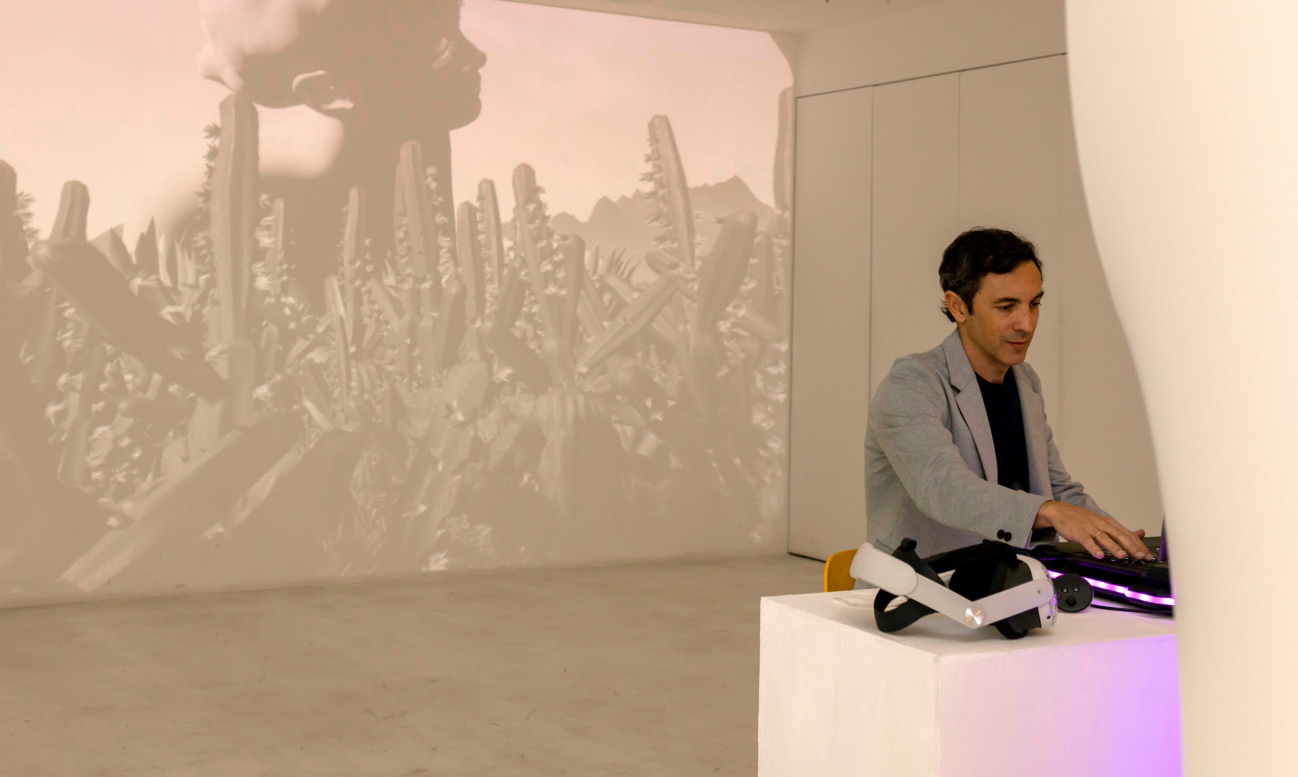 Agustín Di Luciano in his VR installation at an art exhibition